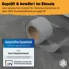 A roll of gray repair tape is shown on a dark gray surface. Produktbild-Vorschau