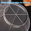 Close-up of a stainless steel mesh strainer with a circular rim and internal support structure. Produktbild-Vorschau