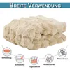 A folded plush blanket with icons and text indicating various uses. Produktbild-Vorschau