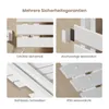 A collage of four images showcasing features of a white electric towel warmer. Produktbild-Vorschau