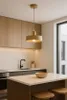 A modern kitchen with a pendant light hanging over an island. Produktbild-Vorschau