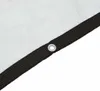 Close-up of a white tarp with a reinforced black edge and a metal grommet. Podgląd zdjęcia produktu