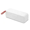 A white Bluetooth speaker with a red carabiner clip attached. Anteprima dell’immagine prodotto