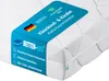 A white mattress with a blue label wrapped around it, displaying product information and branding. Produktbild-Vorschau