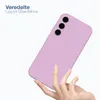 A hand holding a purple phone case against a white background. Produktbild-Vorschau