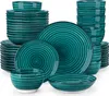 A collection of teal and black spiral-patterned ceramic dinnerware is neatly stacked and arranged against a white background. Produktbild-Vorschau