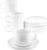 A set of white porcelain mugs and saucers are neatly arranged. Anteprima dell’immagine prodotto
