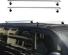 A black van with silver roof racks installed. Náhľad obrázku produktu
