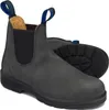 A pair of grey Chelsea boots with black soles and blue pull tabs. Voir les images du produit