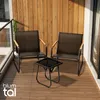 A balcony set with two chairs and a table on a wooden deck, with a wooden wall in the background. Anteprima dell’immagine prodotto