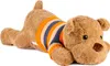 A plush teddy bear lying on its stomach, wearing a striped sweater. Voir les images du produit