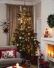 A cozy living room decorated for Christmas, featuring a decorated Christmas tree, gifts, and festive ornaments. Podgląd zdjęcia produktu