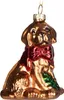 A glass Christmas ornament shaped like a golden retriever dog wearing a red bow. Náhled obrázku produktu