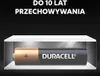 A Duracell battery displayed in a white illuminated case against a black background. Voir les images du produit