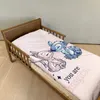 A children's bed with bedding featuring Disney characters Stitch and Angel. Produktbild-Vorschau