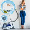 A woman stands next to a vacuum cleaner with graphics overlayed on the image. Voir les images du produit