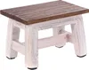 A small wooden stool with a distressed white base and a natural wood top. Produktbild-Vorschau