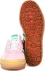 A pair of Adidas Gazelle Bold W sneakers, one shown from the front and the other from the sole. Produktbild-Vorschau