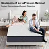 A couple relaxing on a mattress in a bedroom setting. Voir les images du produit
