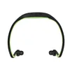 A pair of black and green sport wireless headphones on a white background. Náhľad obrázku produktu