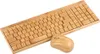 A wooden keyboard and mouse set on a white background. Produktbild-Vorschau
