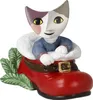A ceramic figurine of a cat sitting in a red boot with green leaves. Anteprima dell’immagine prodotto