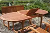 Outdoor wooden furniture set by a pond. Produktbild-Vorschau