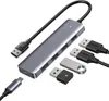 A Ugreen USB hub and various USB devices are arranged on a white background. Produktbild-Vorschau