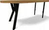 A close-up, low-angle shot of a table with a wooden top and black metal legs. Produktbild-Vorschau