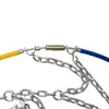 A close-up view of a section of snow chains, showing metal links and colored protective tubing. Produktbild-Vorschau