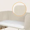 A close-up view of the padded side of a crib or bed, with a white mattress visible. Produktbild-Vorschau