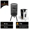 A black metal fire pit on a white background, with its packaging and dimensions shown. Produktbild-Vorschau