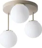 A three-light ceiling lamp with white globe shades and a beige base with gold accents. Produktbild-Vorschau
