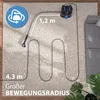A carpet cleaning machine is shown on a plush carpet, demonstrating its reach and maneuverability with a hose laid out in a serpentine pattern. Produktbild-Vorschau