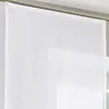 A close-up view of a white sheer curtain hanging from a track. Produktbild-Vorschau