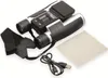 A pair of binoculars with a digital display and accessories, laid out on a white background. Produktbild-Vorschau