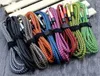 A collection of colorful AUX cables neatly coiled and organized. Produktbild-Vorschau