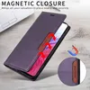 A purple leather flip wallet phone case is shown on a wooden surface next to a laptop. Produktbild-Vorschau