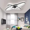 A modern bedroom with a geometric ceiling light. Podgląd zdjęcia produktu