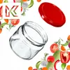 A glass jar and its red lid are shown with various vegetables and herbs arranged around them, suggesting ingredients for preserving. Náhľad obrázku produktu