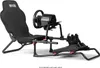 A black racing simulator cockpit with a steering wheel and pedals, shown on a white background. Produktbild-Vorschau