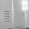 A close-up view of a metal locker with ventilation slots. Voir les images du produit