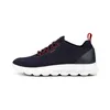 A side view of a blue Geox sneaker with a white sole. Produktbild-Vorschau