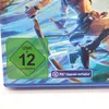 A close-up of a video game case, showing age rating and platform upgrade information. Podgląd zdjęcia produktu