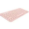 A pink Logitech K380 Bluetooth keyboard is shown from a diagonal, slightly elevated angle against a white background. Produktbild-Vorschau