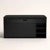 A black shoe cabinet with a padded seat on top, set against a plain white background. Náhľad obrázku produktu