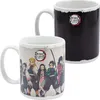 Two Demon Slayer mugs are shown against a white background. One mug is in the foreground with characters printed on it, and the other is in the background, appearing to be a heat-sensitive mug that turns black when cold. Produktbild-Vorschau