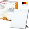 A Beurer daylight therapy lamp and its packaging are shown against a white background. Podgląd zdjęcia produktu