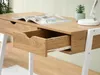 A close-up view of a wooden desk with an open drawer, showing the texture of the wood and the white metal legs. Voir les images du produit