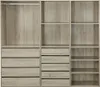 A modular wardrobe set with three elements, showing open compartments and drawers. Anteprima dell’immagine prodotto